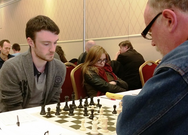 Stephen Moran, playing for and captaining the Trinity team